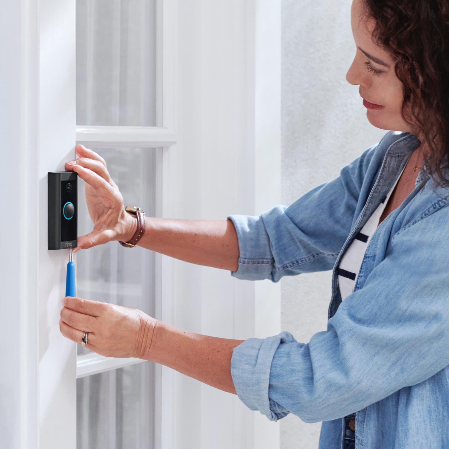 Video Doorbell Wired - Installation of Video Doorbell Wired, viewing visitors and alerts on a smartphone, and talking to a delivery person.