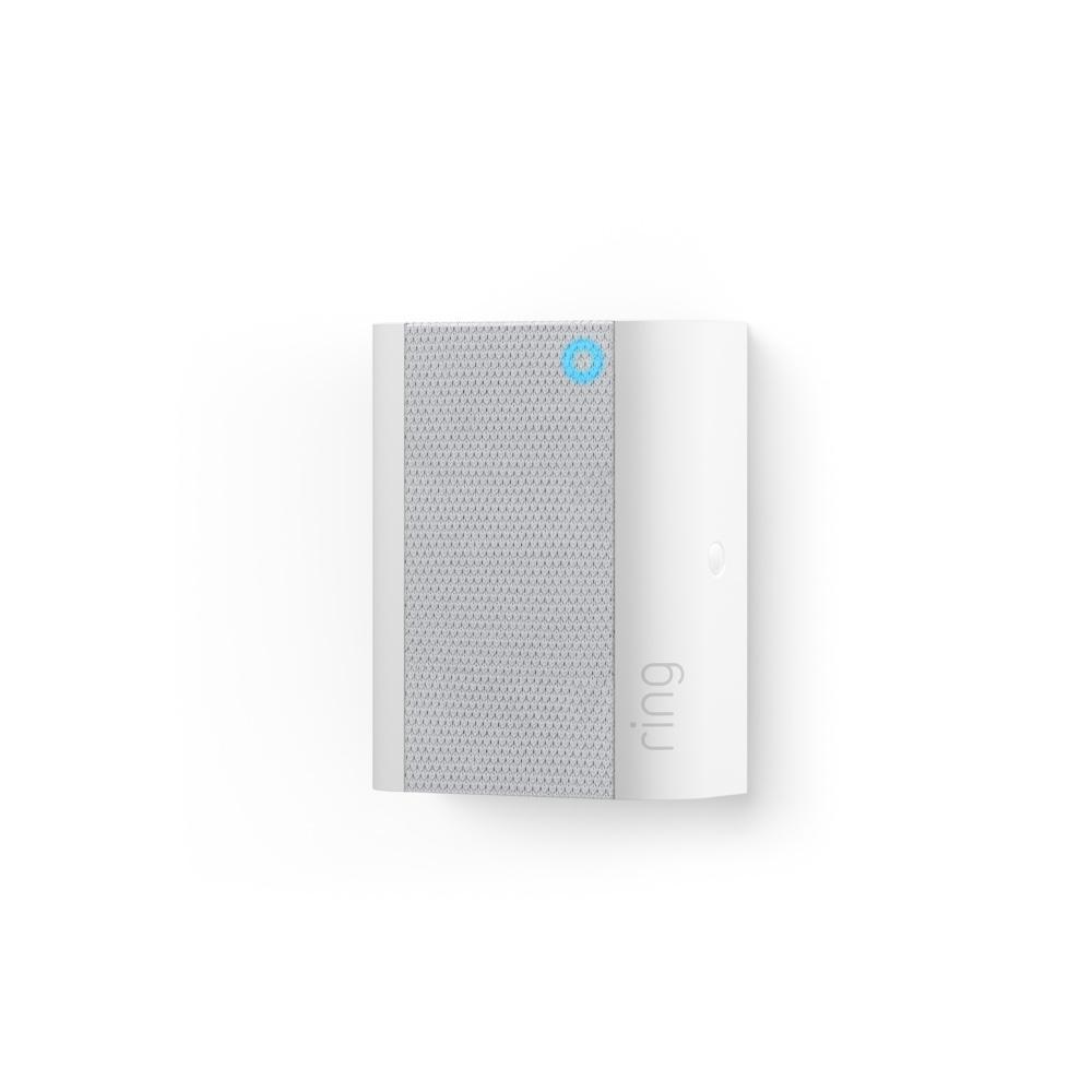 Chime - White Ring Chime with grey speaker and blue indicator light, designed to plug into outlets.